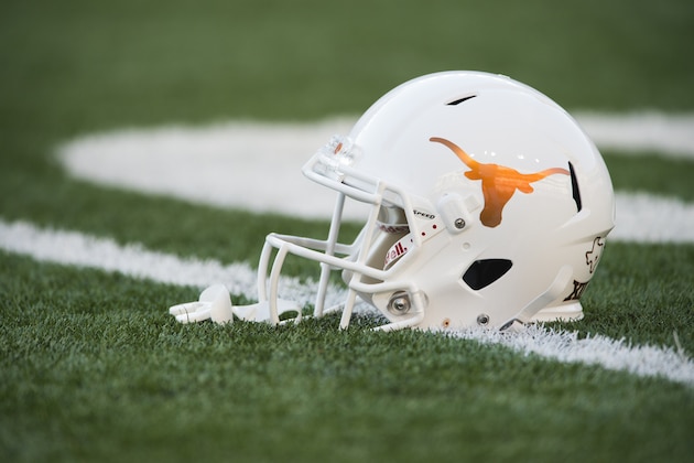 AUSTIN, TX - SEPTEMBER 12: A Texas Longhorns helmet on the field before kickoff against the Rice Owls on September 12, 2015 at Darrell K Royal-Texas Memorial Stadium in Austin, Texas. (Photo by Cooper Neill/Getty Images) AUSTIN, TX - SEPTEMBER 12: A Texas Longhorns helmet on the field before kickoff against the Rice Owls on September 12, 2015 at Darrell K Royal-Texas Memorial Stadium in Austin, Texas. (Photo by Cooper Neill/Getty Images)