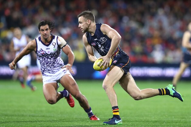 ADELAIDE, AUSTRALIA - MAY 27:  Brodie Smith of the Crows looks upfield during the round 10 AFL match between the Adelaide Crows and the Fremantle Dockers at Adelaide Oval on May 27, 2017 in Adelaide, Australia.  (Photo by Ryan Pierse/Getty Images)