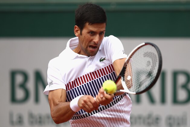 PARIS, FRANCE - MAY 31:  Novak Djokovic of Serbia plays a backhand during the mens singles second round match against Joao Sousa of Portugal on day four of the 2017 French Open at Roland Garros on May 31, 2017 in Paris, France.  (Photo by Julian Finney/Getty Images)