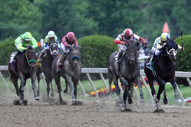 BALTIMORE, MD - MAY 20:  Cloud Computing #2 ridden by Javier Castellano (L) and Classic Empire #5 ridden by Julien Leparoux race to the wire in the home stretch as Cloud Computing won the 142nd Preakness Stakes at Pimlico Race Course on May 20, 2017 in Baltimore, Maryland.  (Photo by Rob Carr/Getty Images)