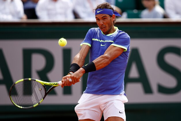 PARIS, FRANCE - MAY 31:  Rafael Nadal of Spain hits a backhand during the second roun match against Robin Haase of The Netherlands on day four of the 2017 French Open at Roland Garros on May 31, 2017 in Paris, France.  (Photo by Adam Pretty/Getty Images)