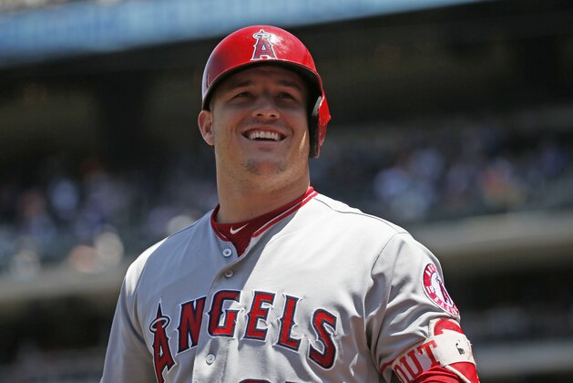 Los Angeles Angels Mike Trout (27) smiles at fans before the start of an interleague baseball game against the New York Mets, Sunday, May 21, 2017, in New York.  (AP Photo/Kathy Willens)