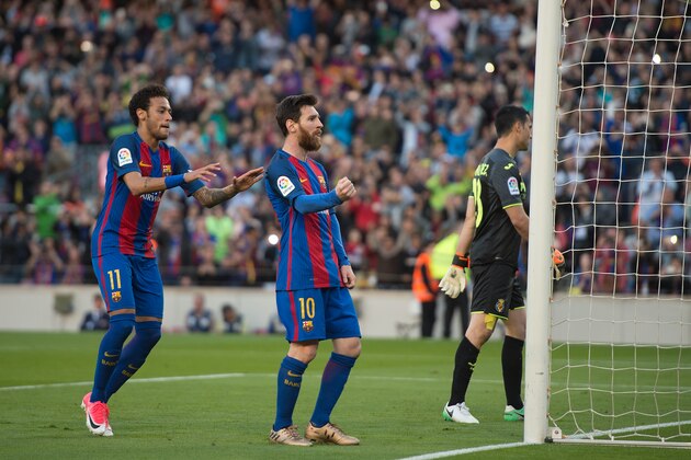 BARCELONA, SPAIN - MAY 06:  Lionel Messi of FC Barcelona celebrates with Neymar after scoring his team's 3rd goal from the penalty spot during of the La Liga match between FC Barcelona and Villarreal CF at Camp Nou stadium on May 6, 2017 in Barcelona, Spain.  (Photo by Denis Doyle/Getty Images)