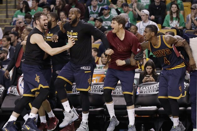 Cleveland Cavaliers, from left, Kevin Love, LeBron James, Kyle Korver and Iman Shumpert celebrate a basket during the second half of Game 5 of the NBA basketball Eastern Conference finals against the Boston Celtics, on Thursday, May 25, 2017, in Boston. (AP Photo/Elise Amendola)
