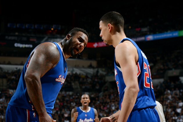 SAN ANTONIO - APRIL 26: Glen Davis #0 and Austin Rivers #25 of the Los Angeles Clippers celebrate during a game against the San Antonio Spurs during Game Four of the Western Conference Quarterfinals at the AT&T Center on April 26, 2015 in San Antonio, Texas. NOTE TO USER: User expressly acknowledges and agrees that, by downloading and or using this photograph, user is consenting to the terms and conditions of the Getty Images License Agreement. Mandatory Copyright Notice: Copyright 2015 NBAE (Photos by Garrett Ellwood/NBAE via Getty Images)
