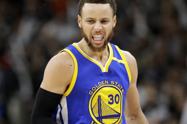 Golden State Warriors guard Stephen Curry (30) celebrates a basket against the San Antonio Spurs during the second half in Game 4 of the NBA basketball Western Conference finals, Monday, May 22, 2017, in San Antonio. (AP Photo/Eric Gay)