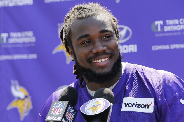 FILE - In this Friday, May 5, 2017 file photo, Minnesota Vikings rookie running back Dalvin Cook speaks to the media during the NFL football team rookies minicamp in Eden Prairie, Minn.  (AP Photo/Jim Mone, File)