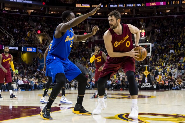 CLEVELAND, OH - DECEMBER 25: Draymond Green #23 of the Golden State Warriors puts pressure on Kevin Love #0 of the Cleveland Cavaliers during the second half at Quicken Loans Arena on December 25, 2016 in Cleveland, Ohio. The Cavaliers defeated the Warriors 109-108. NOTE TO USER: User expressly acknowledges and agrees that, by downloading and/or using this photograph, user is consenting to the terms and conditions of the Getty Images License Agreement. Mandatory copyright notice. (Photo by Jason Miller/Getty Images)