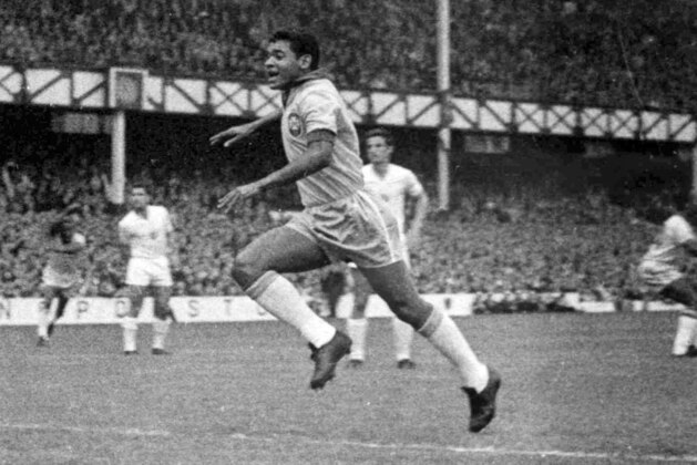 ** ADVANCE FOR WEEKEND EDITONS, MAY 29-30 **  FILE- In this July 12, 1966, file photo, Brazil forward Garrincha runs towards the Bulgaria goal after scoring the second goal for his country in a World Cup soccer match at Goodison Park in Liverpool, England. (AP Photo/Bippa, File)