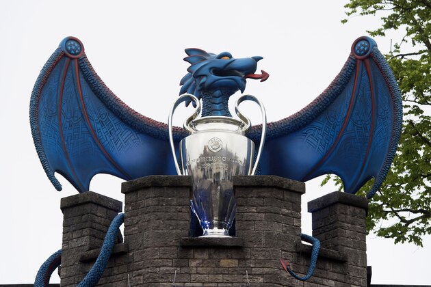 CARDIFF, WALES - MAY 29:  A large blue dragon with a Champions League trophy is seen in Cardiff Castle in Cardiff city centre on May 29, 2017 in Cardiff, Wales. Preparations are underway for the UEFA Champions League final which will be held on June 3 at the National Stadium of Wales in Cardiff. Extra security measures have been put in place in the city centre. The terror threat level has been reduced from critical to severe following a terrorist attack in which 22 people were killed at an Ariana Grande concert in Manchester.  (Photo by Matthew Horwood/Getty Images)