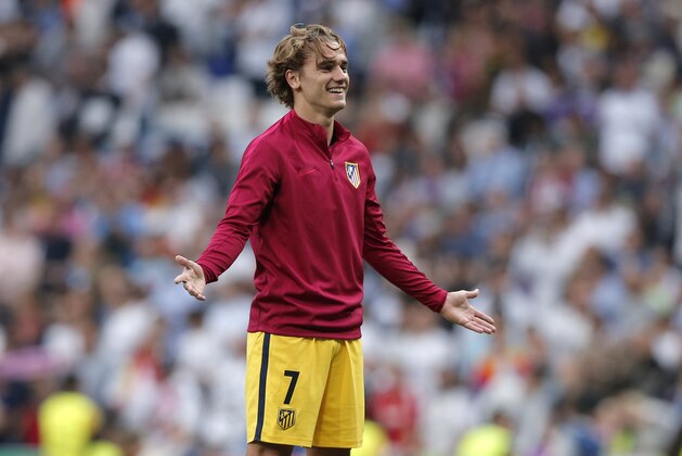Atletico's Antoine Griezmann gestures during warm up before the Champions League semifinals first leg soccer match between Real Madrid and Atletico Madrid at Santiago Bernabeu stadium in Madrid, Spain, Tuesday May 2, 2017. (AP Photo/Daniel Ochoa de Olza)