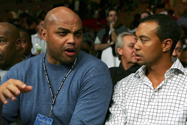LAS VEGAS - NOVEMBER 04: Former NBA star Charles Barkley (L) talks with PGA star Tiger Woods diuring the Robert Guerrero and Orlando Salido of Mexico IBF Featherweight Championship fight at the Mandalay Bay Events Center November 4, 2006 in Las Vegas, Nevada. (Photo by Ethan Miller/Getty Images)