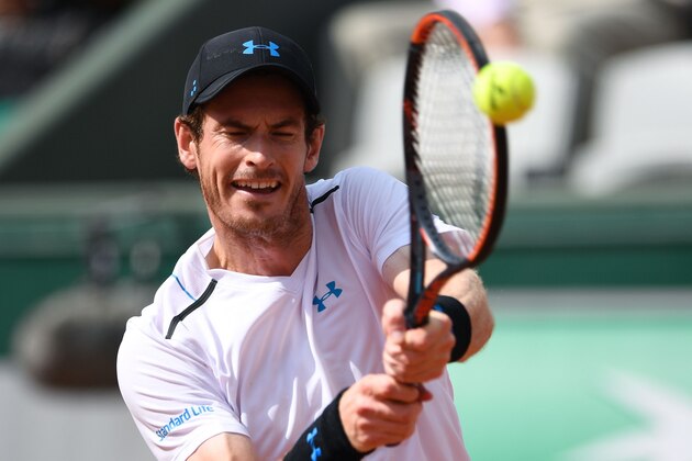 Britain's Andy Murray returns the ball to Slovakia's Martin Klizan during their tennis match at the Roland Garros 2017 French Open on June 1, 2017 in Paris.  / AFP PHOTO / Eric FEFERBERG        (Photo credit should read ERIC FEFERBERG/AFP/Getty Images)