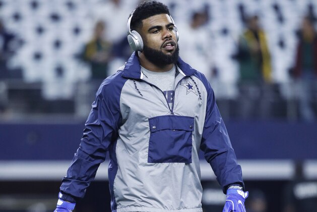 ARLINGTON, TX - JANUARY 15: Ezekiel Elliott #21 of the Dallas Cowboys looks on before the NFC Divisional Playoff game against the Green Bay Packers at AT&T Stadium on January 15, 2017 in Arlington, Texas. The Packers defeated the Cowboys 34-31. (Photo by Joe Robbins/Getty Images)