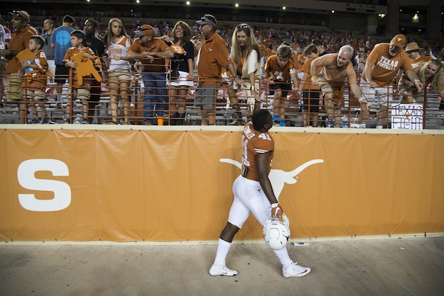 AUSTIN, TX - SEPTEMBER 10:  Erick Fowler #41 of the Texas Longhorns celebrates with fans after defeating the UTEP Miners 41-7 on September 10, 2016 at Royal Memorial Stadium in Austin, Texas.  (Photo by Cooper Neill/Getty Images)