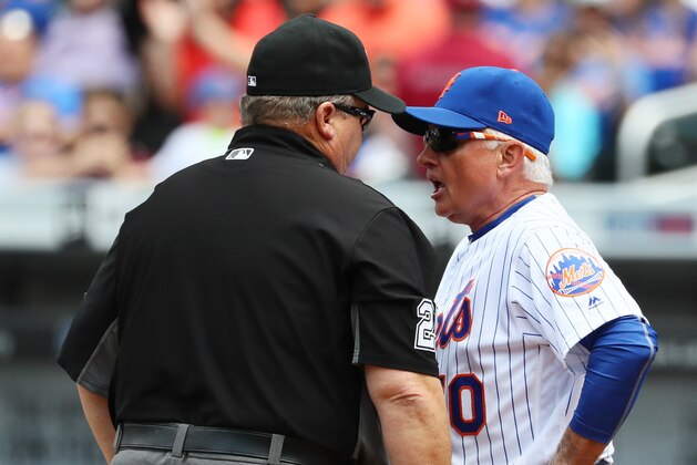 NEW YORK, NY - JUNE 01:  Manager Terry Collins #10 of the New York Mets is thrown out of the game by third base umpire Fieldin Culbreth in the fourth inning during their game at Citi Field on June 1, 2017 in New York City. Collins argued a call that Wilmer Flores #4 was interfered by the batboy while chasing a foul ball.  (Photo by Al Bello/Getty Images)