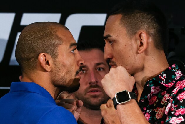 RIO DE JANEIRO, BRAZIL - JUNE 01: UFC featherweight fighters Jose Aldo (L) of Brazil and Max Holloway of the United States face off during Ultimate Media Day at Windsor Hotel on June 01, 2017 in Rio de Janeiro, Brazil. (Photo by Buda Mendes/Zuffa LLC/Zuffa LLC via Getty Images)