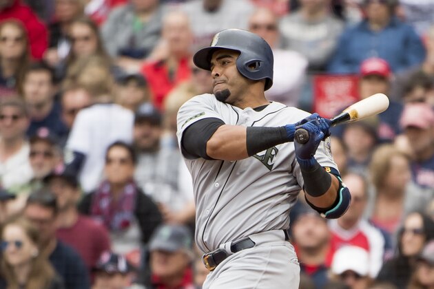 BOSTON, MA - MAY 28: Nelson Cruz  #23  of the Seattle Mariners hits an RBI single against the Boston Red Sox in the seventh inning at Fenway Park on May 28, 2017 in Boston, Massachusetts.  (Photo by Michael Ivins/Boston Red Sox/Getty Images)