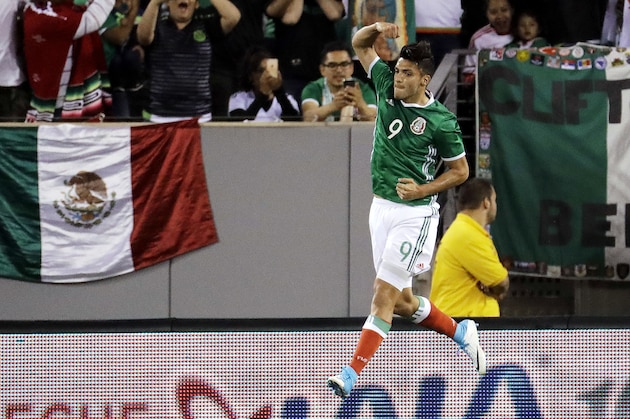 Mexico's Raul Jimenez celebrates after scoring on a penalty kick against Ireland during the first half of an international friendly soccer match, Thursday, June 1, 2017, at MetLife Stadium in East Rutherford, N.J. (AP Photo/Julio Cortez)