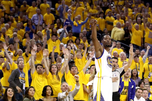 OAKLAND, CA - JUNE 01:  Kevin Durant #35 of the Golden State Warriors watches his three-point shot in Game 1 of the 2017 NBA Finals against the Cleveland Cavaliers at ORACLE Arena on June 1, 2017 in Oakland, California. NOTE TO USER: User expressly acknowledges and agrees that, by downloading and or using this photograph, User is consenting to the terms and conditions of the Getty Images License Agreement.  (Photo by Ezra Shaw/Getty Images)