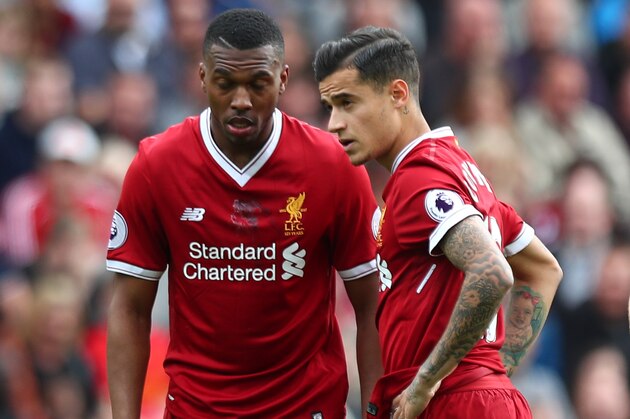 LIVERPOOL, ENGLAND - MAY 21: Daniel Sturridge of Liverpool and Philippe Coutinho of Liverpool before Philippe Coutinho of Liverpool takes a free kick to score a goal to make it 2-0 during the Premier League match between Liverpool and Middlesbrough at Anfield on May 21, 2017 in Liverpool, England. (Photo by Robbie Jay Barratt - AMA/Getty Images)