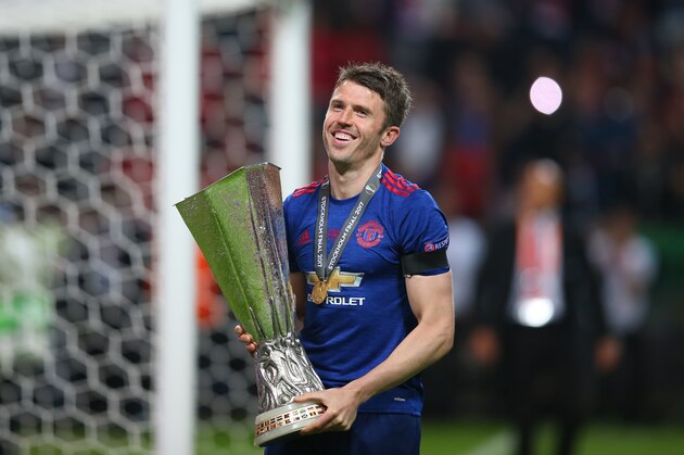 STOCKHOLM, SWEDEN - MAY 24:  Michael Carrick of Manchester United celebrates with the trophy during the UEFA Europa League Final match between Ajax and Manchester United at Friends Arena on May 24, 2017 in Stockholm, Sweden. (Photo by Catherine Ivill - AMA/Getty Images)