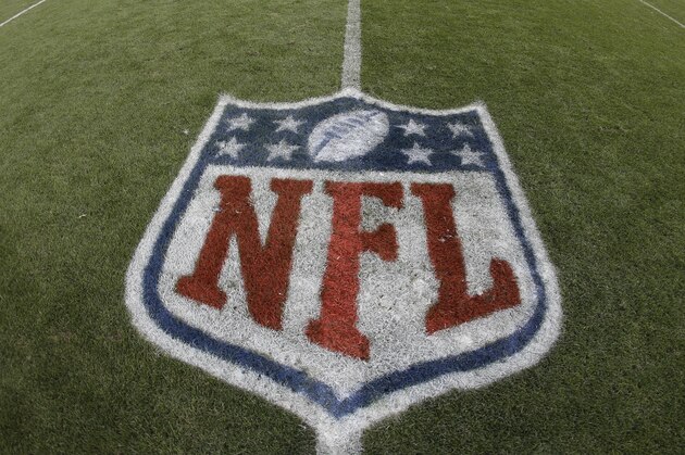 The NFL shield logo is shown painted on the field at Sports Authority Field at Mile High before an NFL football game between the Denver Broncos and the Oakland Raiders, Sunday, Jan. 1, 2017, in Denver. (AP Photo/Jack Dempsey)
