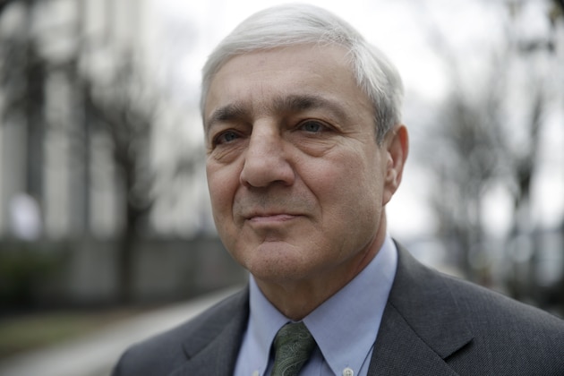 Former Penn State president Graham Spanier walks from the Dauphin County Courthouse in Harrisburg, Pa., Friday, March 24, 2017. Spanier was convicted Friday of hushing up suspected child sex abuse in 2001 by Jerry Sandusky, whose arrest a decade later blew up into a major scandal for the university and led to the firing of beloved football coach Joe Paterno. (AP Photo/Matt Rourke)