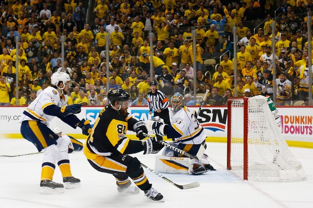 PITTSBURGH, PA - MAY 31:  Phil Kessel #81 of the Pittsburgh Penguins reacts to a goal by Evgeni Malkin #71 during the third period in Game Two of the 2017 NHL Stanley Cup Final against the Nashville Predators at PPG Paints Arena on May 31, 2017 in Pittsburgh, Pennsylvania.  (Photo by Kirk Irwin/Getty Images)