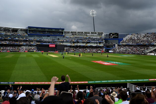 BIRMINGHAM, ENGLAND - JUNE 02:  Dark skies approach as Adam Milne of New Zealand dismisses Aaron Finch of Australia during the ICC Champions Trophy match between Australia and New Zealand at Edgbaston on June 2, 2017 in Birmingham, England.  (Photo by Gareth Copley/Getty Images)