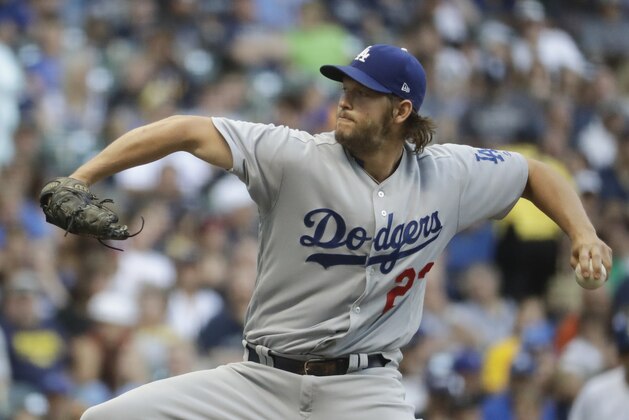 Los Angeles Dodgers starting pitcher Clayton Kershaw throws during the first inning of a baseball game against the Milwaukee Brewers Friday, June 2, 2017, in Milwaukee. (AP Photo/Morry Gash)