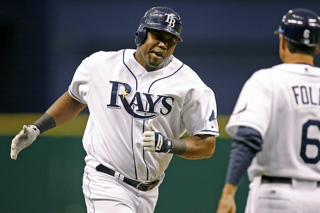 Tampa Bay Rays' Cliff Floyd rounds third base after his solo home run during the second inning of a baseball game against the Chicago Cubs Tuesday, June 17, 2008, in St. Petersburg, Fla. Tampa Bay won 3-2. (AP Photo/Mike Carlson)