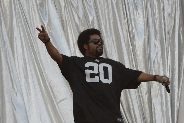 OAKLAND, CA - SEPTEMBER 10:  American Rapper/Movie Star Ice Cube performs before the season opener of an NFL football game between the San Diego Chargers and Oakland Raiders at Oakland-Alameda County Coliseum on September 10, 2012 in Oakland, California. The Chargers won the game 22-14.  (Photo by Thearon W. Henderson/Getty Images)