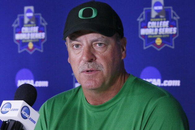 Oregon softball head coach Mike White answers a question during a news conference in Oklahoma City, Wednesday, May 31, 2017. The Women's College World Series begins Thursday, June 1, 2017. (AP Photo/Sue Ogrocki)