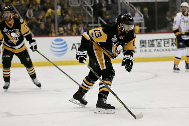 Pittsburgh Penguins' Nick Bonino (13) plays against the Nashville Predators in game 2 of the NHL Stanley Cup Finals hockey game, Wednesday, May 31, 2017, in Pittsburgh. (AP Photo/Keith Srakocic)