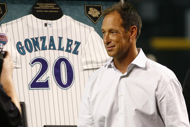 Luis Gonzalez gets his number twenty retired by the Arizona Diamondbacks before a game against the San Diego Padres on Saturday, Aug. 7, 2010, in Phoenix. (AP Photo/Rick Scuteri) Luis Gonzalez gets his number twenty retired by the Arizona Diamondbacks before a game against the San Diego Padres on Saturday, Aug. 7, 2010, in Phoenix. (AP Photo/Rick Scuteri)