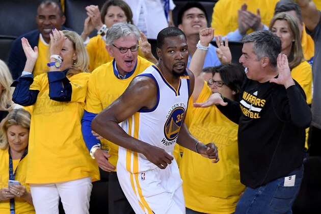 OAKLAND, CA - JUNE 01:  Kevin Durant #35 of the Golden State Warriors reacts after a play against the Cleveland Cavaliers in Game 1 of the 2017 NBA Finals at ORACLE Arena on June 1, 2017 in Oakland, California. NOTE TO USER: User expressly acknowledges and agrees that, by downloading and or using this photograph, User is consenting to the terms and conditions of the Getty Images License Agreement.  (Photo by Thearon W. Henderson/Getty Images)