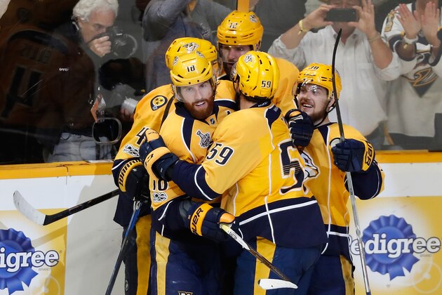 NASHVILLE, TN - JUNE 03:  James Neal #18 of the Nashville Predators celebrates with teammates after scoring a second period goal against Matt Murray #30 of the Pittsburgh Penguins (not pictured) in Game Three of the 2017 NHL Stanley Cup Final at the Bridgestone Arena on June 3, 2017 in Nashville, Tennessee.  (Photo by Justin K. Aller/Getty Images)