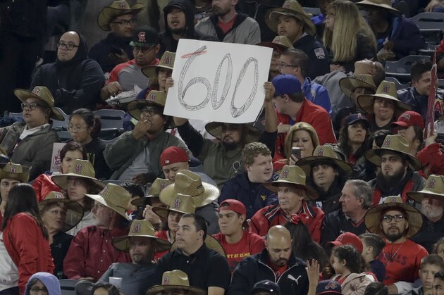 A fan holds up a sign as Los Angeles Angels' Albert Pujols came to bat during the fourth inning of the Angels' baseball game against the Atlanta Braves in Anaheim, Calif., Wednesday, May 31, 2017. Pujols is one home run away from 600. (AP Photo/Chris Carlson)