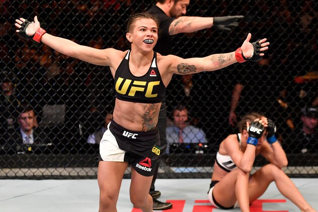 RIO DE JANEIRO, BRAZIL - JUNE 03:  Claudia Gadelha of Brazil celebrates after her submission victory over Karolina Kowalkiewicz of Poland in their womens strawweight bout during the UFC 212 event at Jeunesse Arena on June 3, 2017 in Rio de Janeiro, Brazil. (Photo by Jeff Bottari/Zuffa LLC/Zuffa LLC via Getty Images)