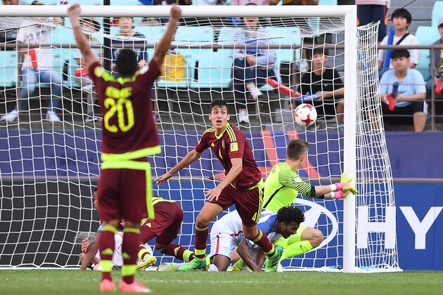 Venezuela's defender Nahuel Ferraresi (C) reacts after scoring during their U-20 World Cup quarter-final football match between Venezuela and the US in Jeonju on June 4, 2017.  / AFP PHOTO / JUNG Yeon-Je        (Photo credit should read JUNG YEON-JE/AFP/Getty Images)
