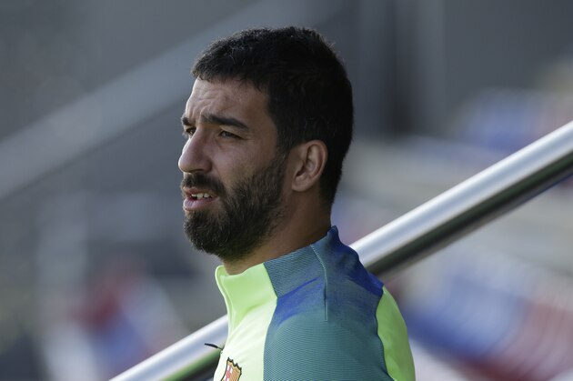 FC Barcelona's Arda Turan attends a training session at the Sports Center FC Barcelona Joan Gamper in Sant Joan Despi, Spain, Saturday, March 18, 2017. FC Barcelona will play against Valencia during a Spanish La Liga on Sunday. (AP Photo/Manu Fernandez)