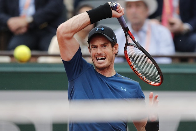 Britain's Andy Murray returns the ball to Argentina's Juan Martin del Potro during their third round match of the French Open tennis tournament at the Roland Garros stadium, Saturday, June 3, 2017 in Paris. Murray won 7-6, 7-5, 6-0. (AP Photo/Christophe Ena)