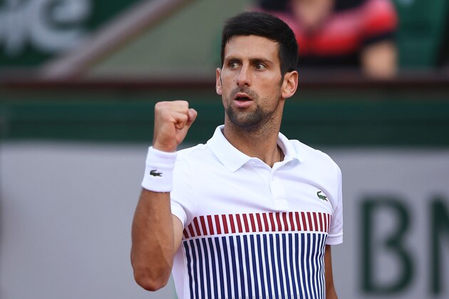 Serbia's Novak Djokovic celebrates after winning a point against Spain's Albert Ramos-Vinolas during their tennis match at the Roland Garros 2017 French Open on June 4, 2017 in Paris.  / AFP PHOTO / Eric FEFERBERG        (Photo credit should read ERIC FEFERBERG/AFP/Getty Images)
