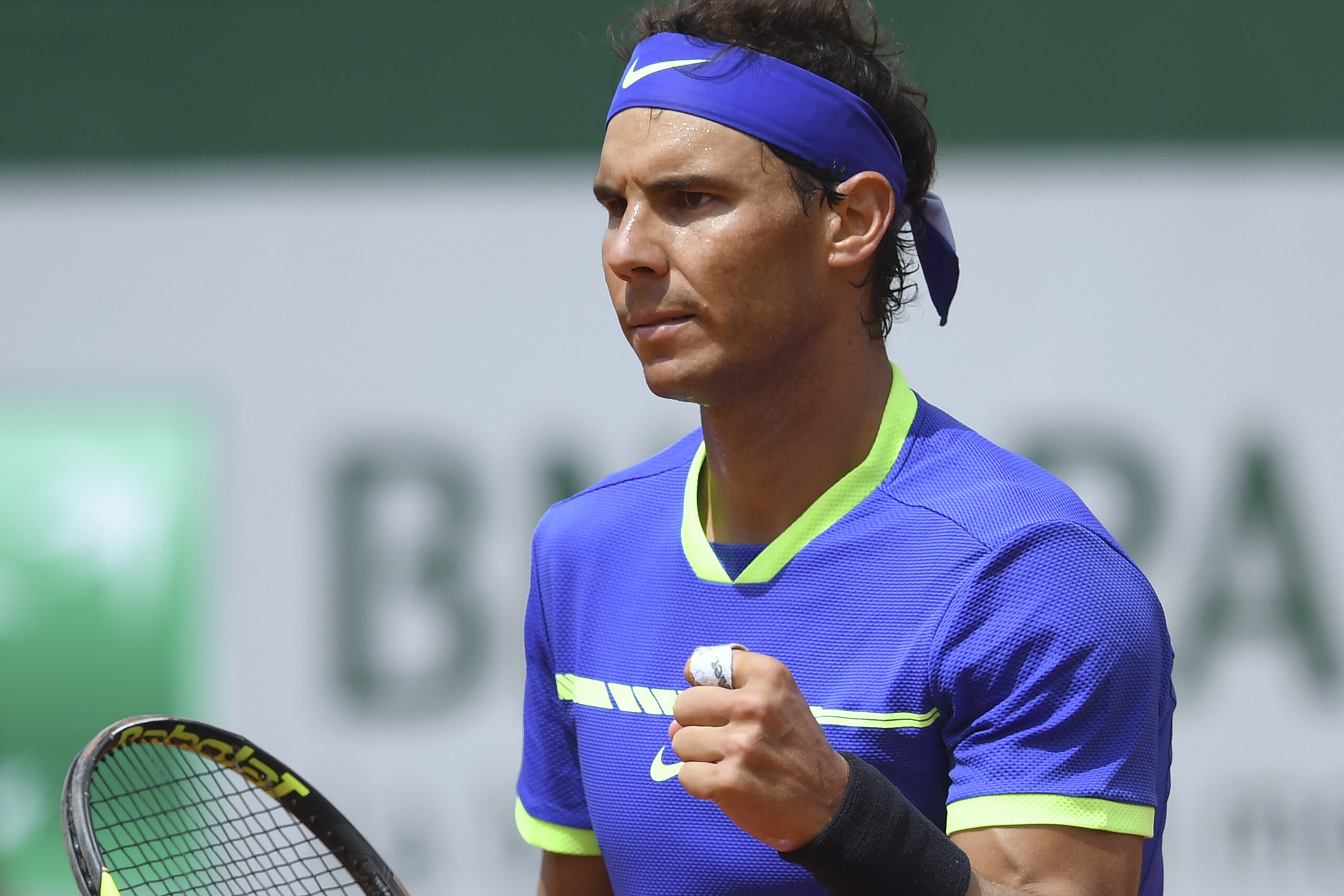 Spain's Rafael Nadal celebrates after winning his tennis match against Spain's Roberto Bautista Agut at the Roland Garros 2017 French Open on June 4, 2017 in Paris.  / AFP PHOTO / GABRIEL BOUYS        (Photo credit should read GABRIEL BOUYS/AFP/Getty Images)