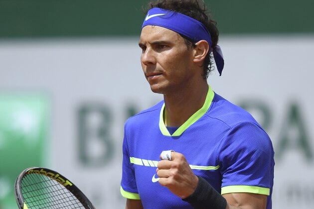 Spain's Rafael Nadal celebrates after winning his tennis match against Spain's Roberto Bautista Agut at the Roland Garros 2017 French Open on June 4, 2017 in Paris.  / AFP PHOTO / GABRIEL BOUYS        (Photo credit should read GABRIEL BOUYS/AFP/Getty Images)