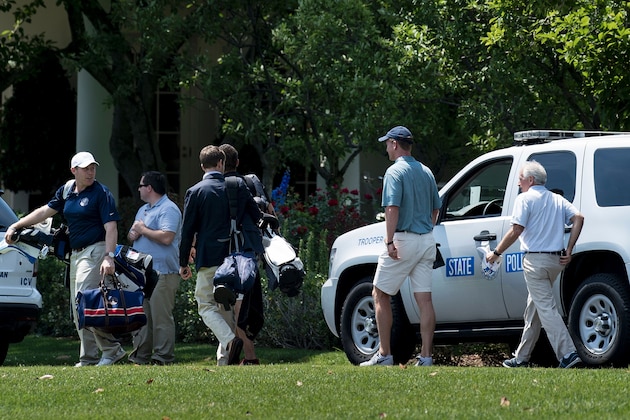 Former NFL quarterback Peyton Manning (2R) and Senator Bob Corker (R-TN) (R) walk with others after retiring to the White House with US President Donald Trump from the Trump National Golf Club June 4, 2017 in Washington, DC. / AFP PHOTO / Brendan Smialowski        (Photo credit should read BRENDAN SMIALOWSKI/AFP/Getty Images)