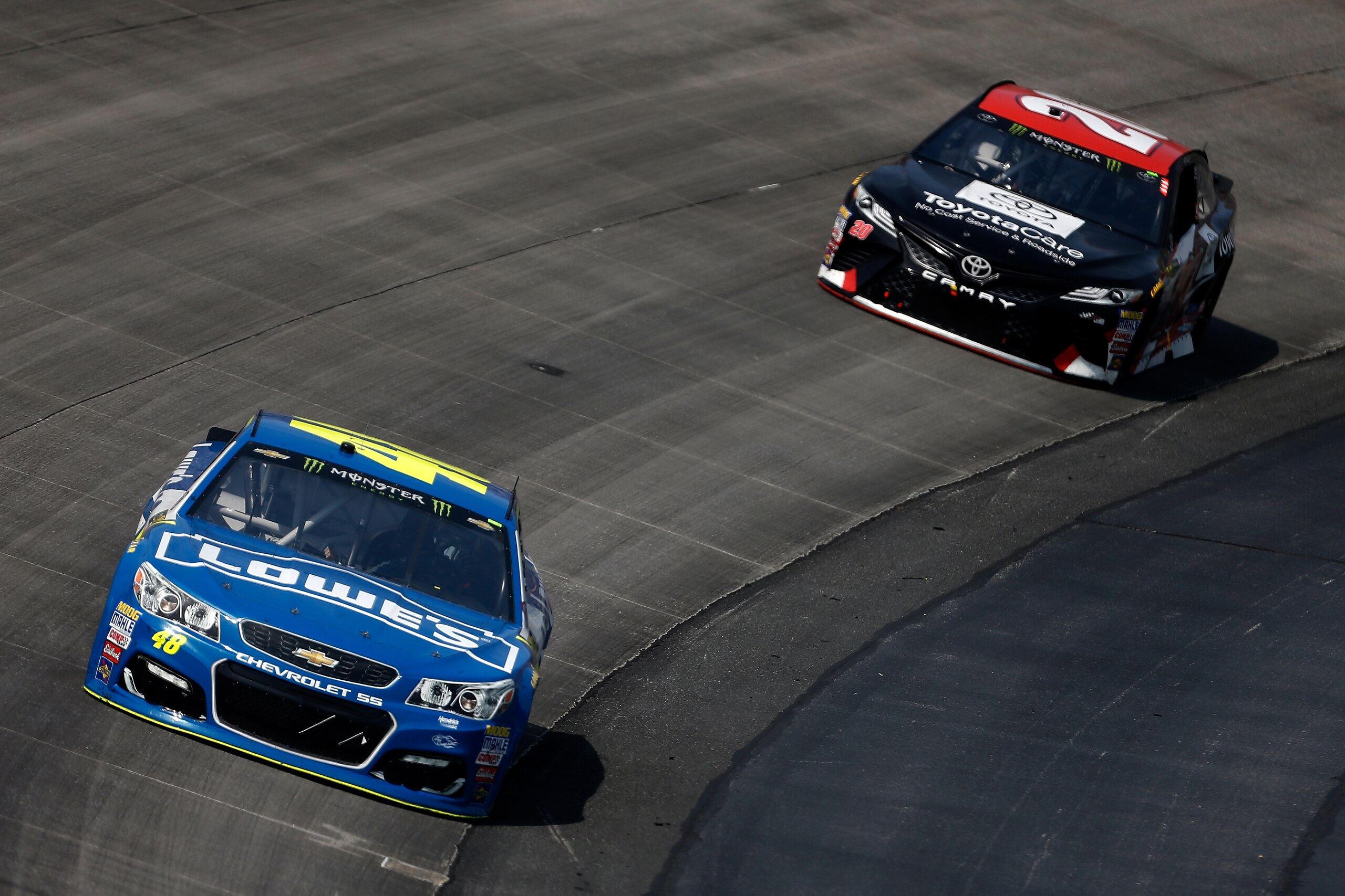 DOVER, DE - JUNE 04:  Jimmie Johnson, driver of the #48 Lowe's Chevrolet, leads Matt Kenseth, driver of the #20 ToyotaCare Toyota, during the Monster Energy NASCAR Cup Series AAA 400 Drive for Autism at Dover International Speedway on June 4, 2017 in Dover, Delaware.  (Photo by Matt Hazlett/Getty Images)
