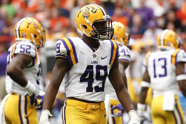 LSU defensive end Arden Key (49) waits for a play during the second half of an NCAA college football game against Syracuse on Saturday, Sept. 26, 2015, in Syracuse, N.Y. (AP Photo/Mike Groll)