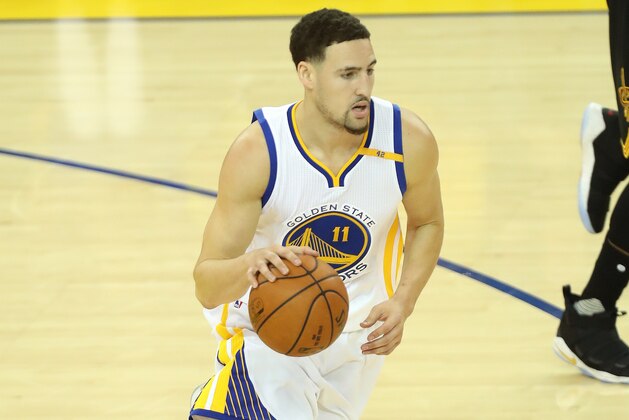 OAKLAND, CA - JUNE 4: Klay Thompson #11 of the Golden State Warriors handles the ball against the Cleveland Cavaliers in Game Two of the 2017 NBA Finals on June 4, 2017 at ORACLE Arena in Oakland, California. NOTE TO USER: User expressly acknowledges and agrees that, by downloading and or using this photograph, user is consenting to the terms and conditions of Getty Images License Agreement. Mandatory Copyright Notice: Copyright 2017 NBAE (Photo by Joe Murphy/NBAE via Getty Images)